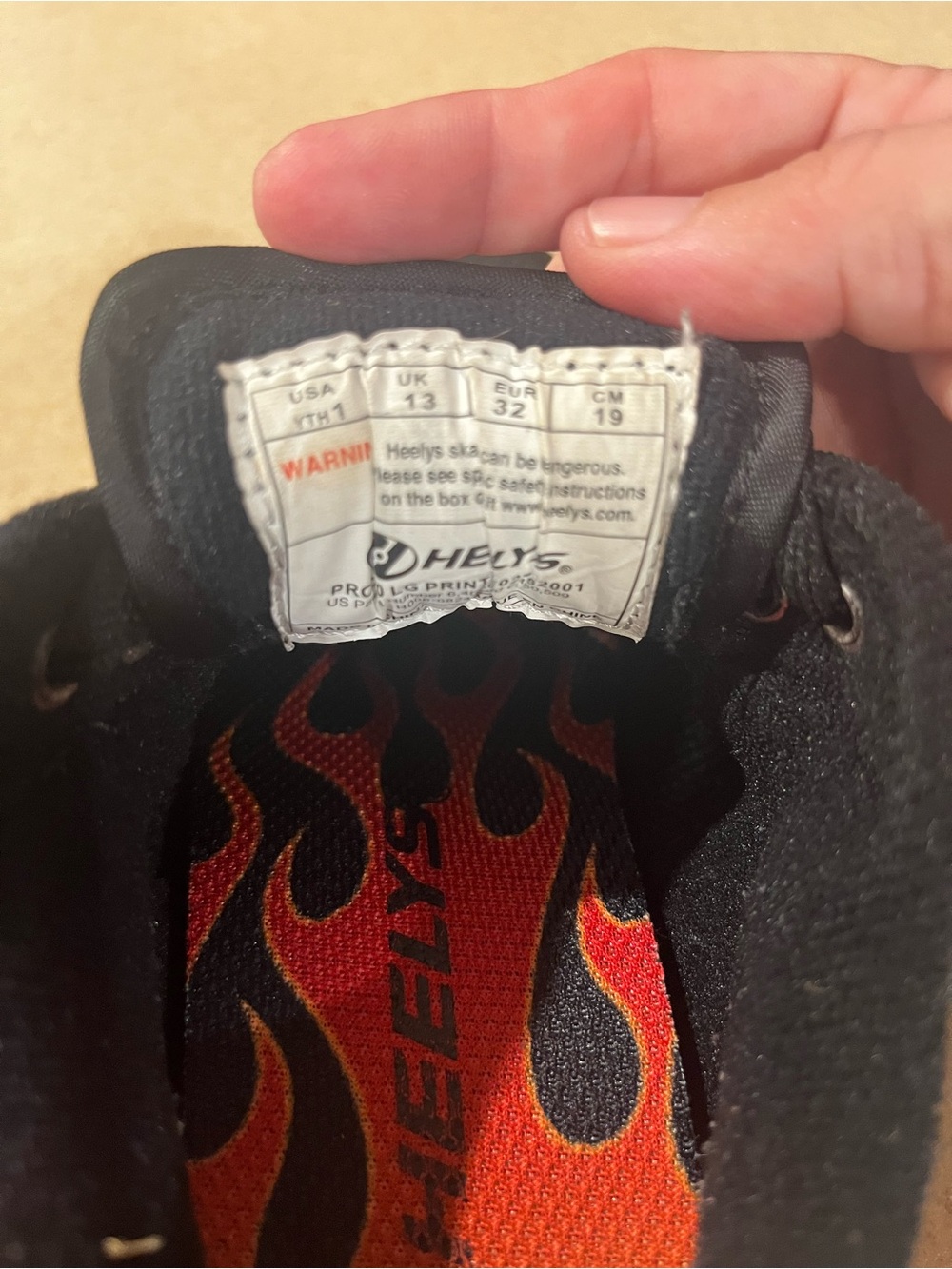 Heelys Kids Black Shoe with Red and Orange Flame Insole